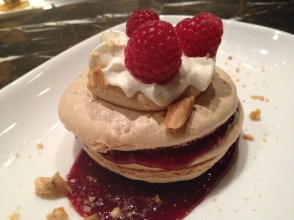 Dacquoise with creamy peanut butter mousse, peanut meringue, raspberry jam and salted peanut brittle.